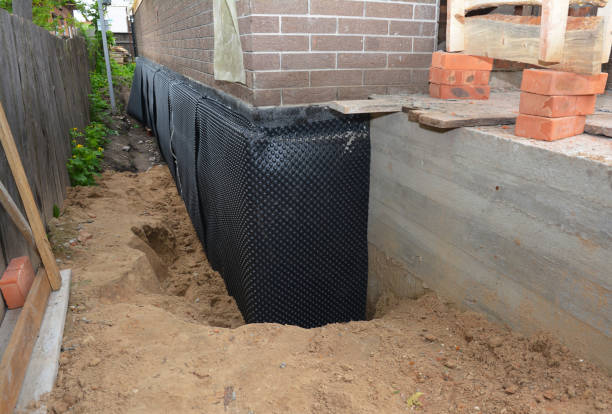 SJ Waterproofing Pros technician performing targeted Foundation Crack Repair assessment in Sunbury, PA
